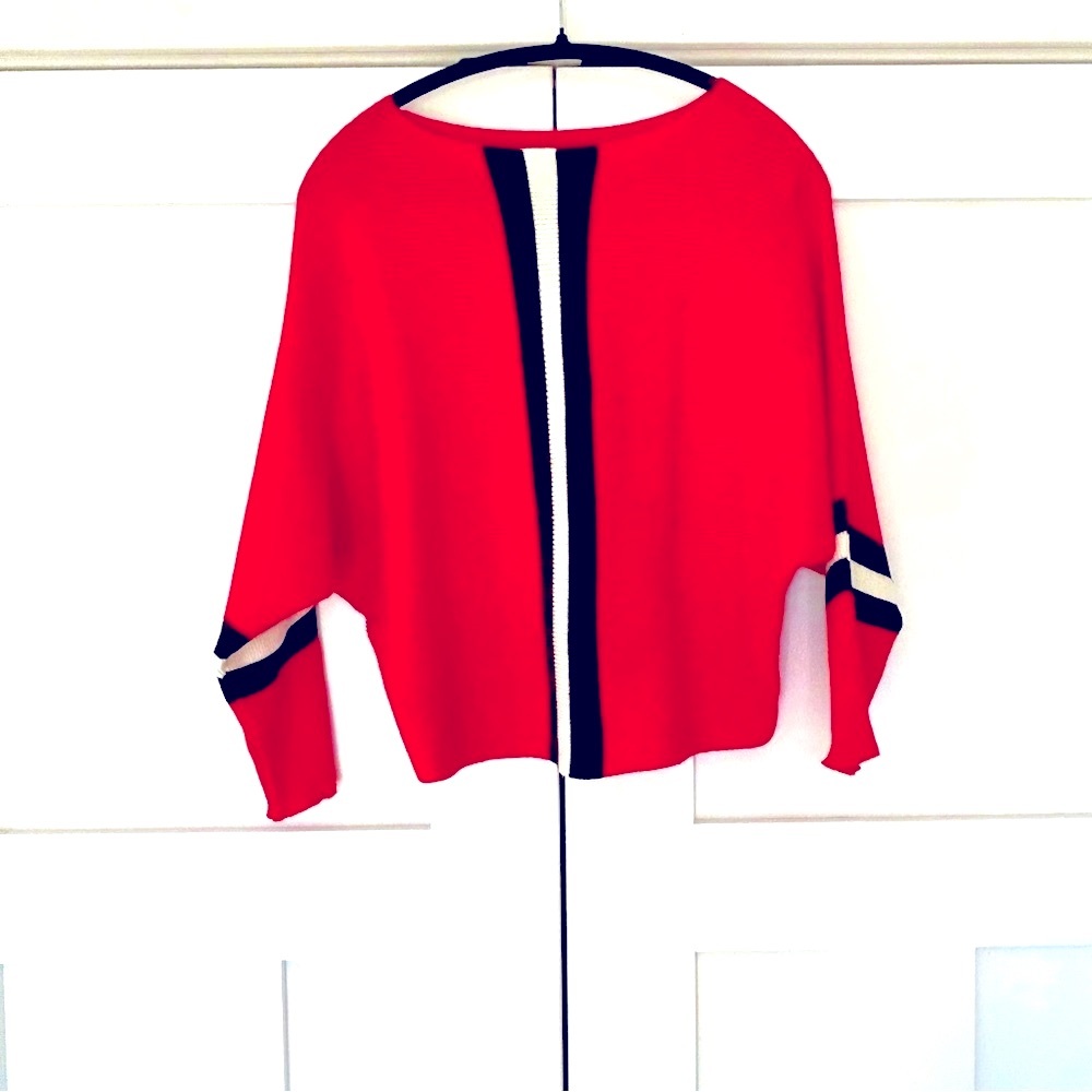 296.  Cropped Ribbed sweater